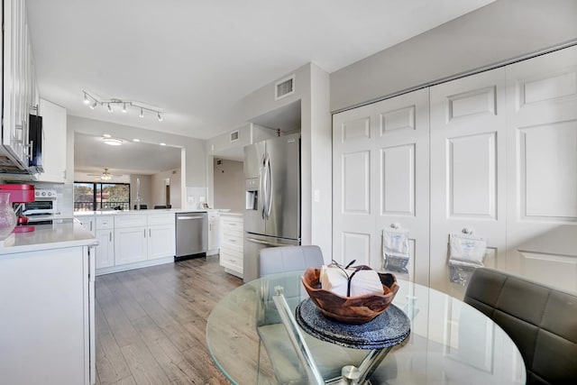 dining room with hardwood / wood-style floors