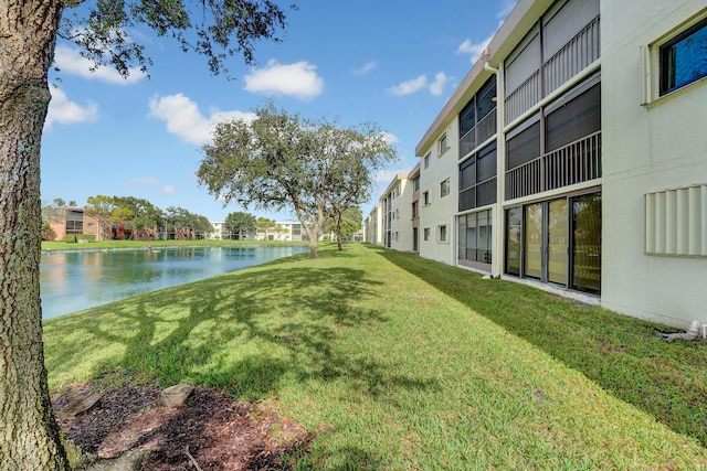 view of yard with a water view