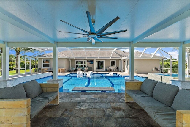 view of pool featuring an in ground hot tub, an outdoor living space, ceiling fan, a patio, and glass enclosure