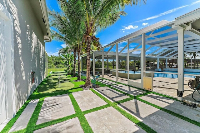 view of patio / terrace with a lanai