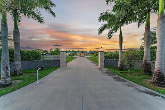 view of gate at dusk