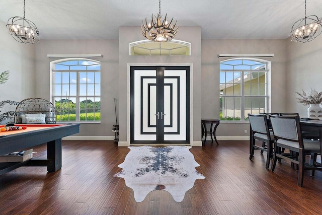 foyer with dark wood-type flooring