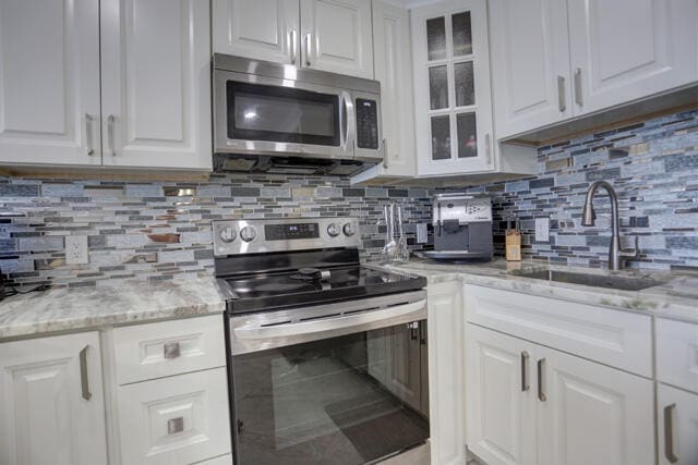 kitchen with white cabinets and stainless steel appliances