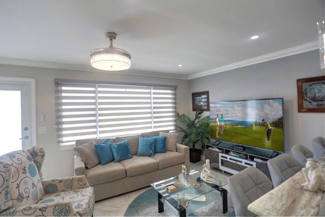 living room featuring crown molding