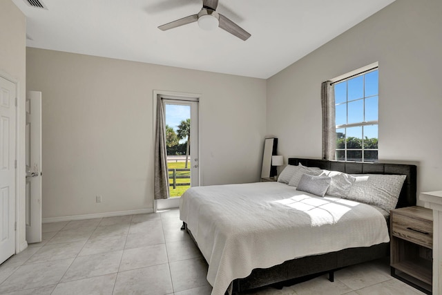 bedroom with access to outside, ceiling fan, and light tile patterned floors