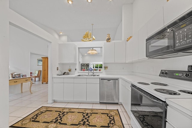 kitchen featuring electric range, sink, white cabinets, and stainless steel dishwasher