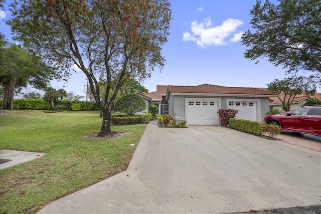 view of front facade featuring a garage and a front yard