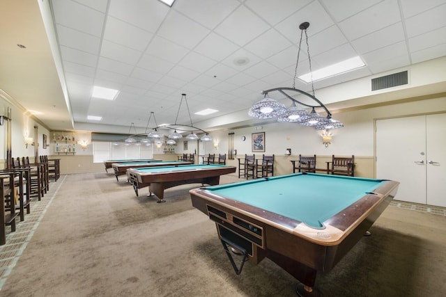 game room with a paneled ceiling, light colored carpet, and pool table