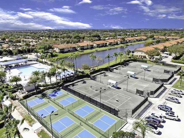 birds eye view of property featuring a water view