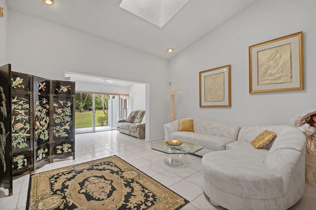 living room featuring light tile patterned floors and vaulted ceiling