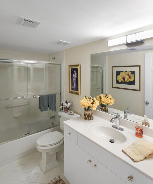 bathroom featuring vanity, tile patterned floors, and plus walk in shower