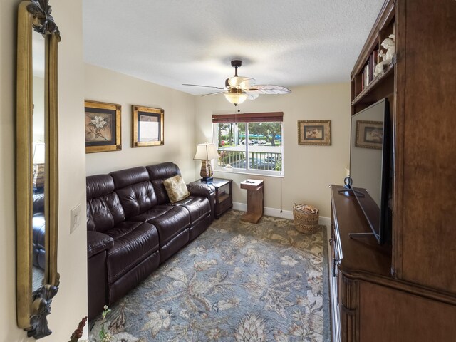 dining area featuring a textured ceiling and light tile patterned floors