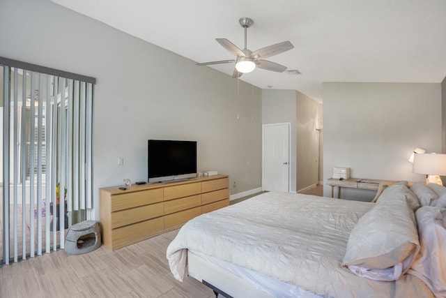 bedroom with ceiling fan and lofted ceiling