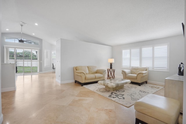 living room with vaulted ceiling and ceiling fan