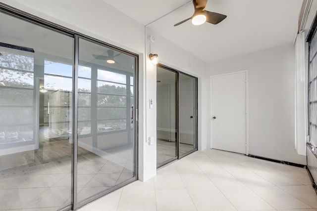 interior space featuring ceiling fan