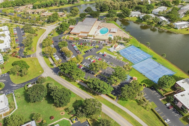 drone / aerial view with a water view