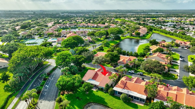 drone / aerial view featuring a water view