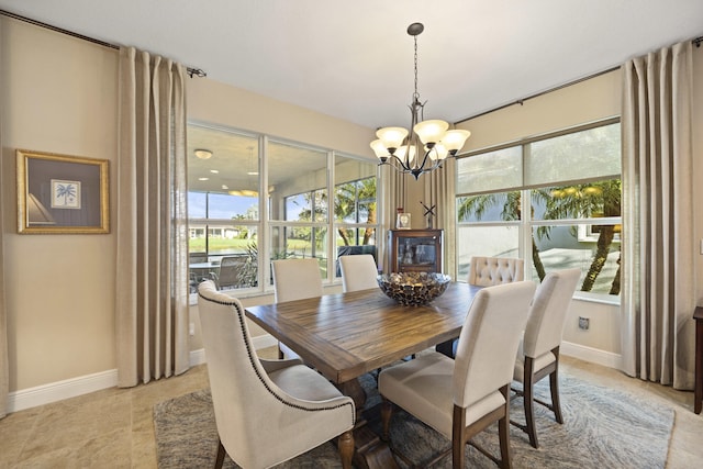 dining area with a chandelier and a healthy amount of sunlight