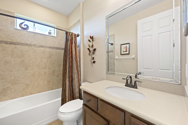 full bathroom featuring toilet, shower / bath combo, and vanity