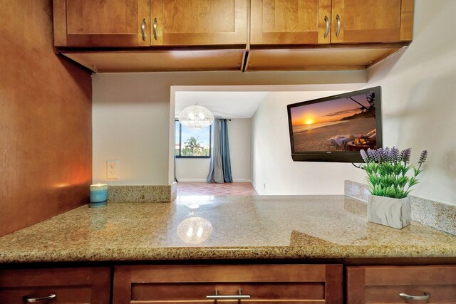 kitchen with light stone countertops