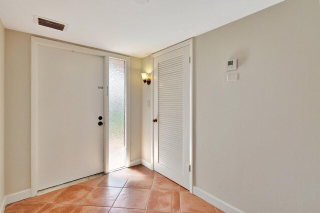 view of tiled foyer entrance