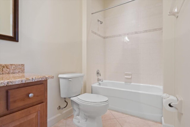 full bathroom featuring vanity, tile patterned flooring, tiled shower / bath, and toilet