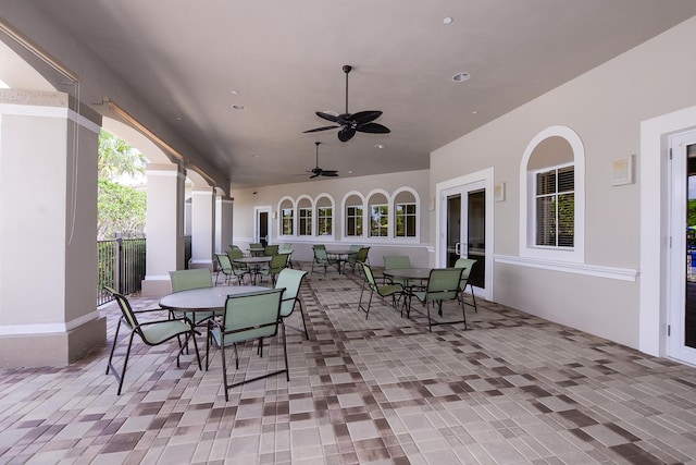 view of patio with french doors and ceiling fan