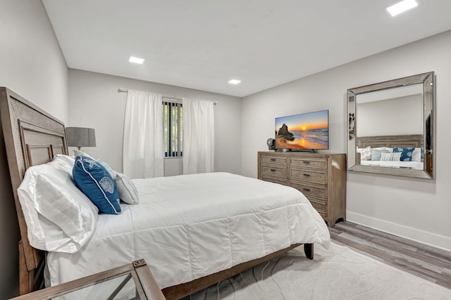 bedroom featuring hardwood / wood-style floors