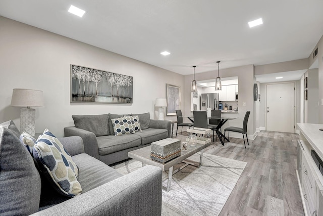 living room with light wood-type flooring