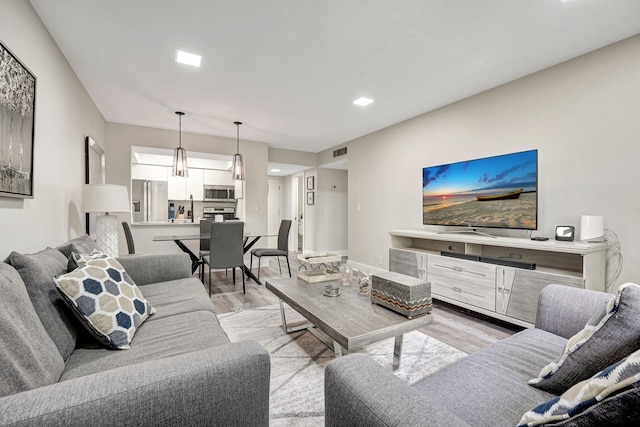 living room with light wood-type flooring