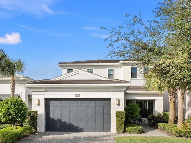 view of front of property featuring a garage