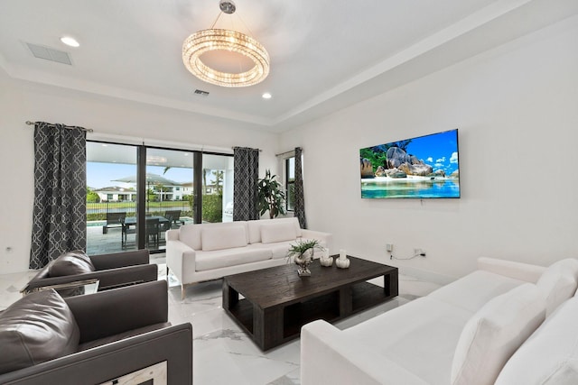 living room with a tray ceiling