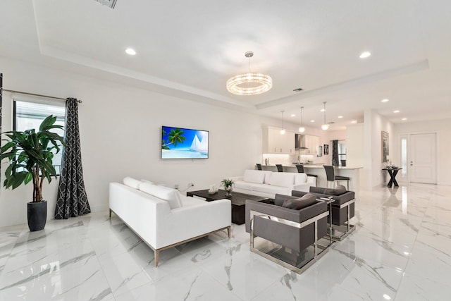 living room with a raised ceiling