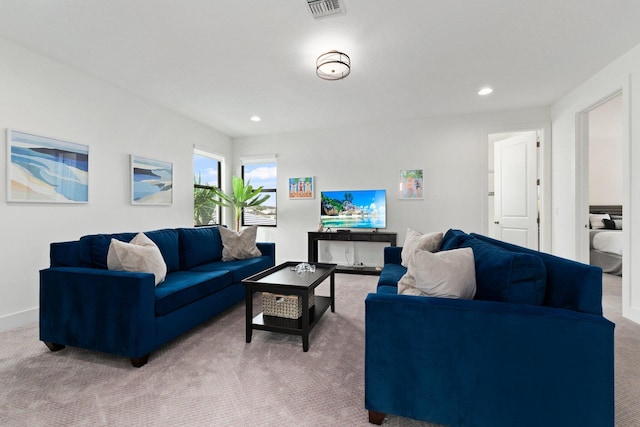 13689 Artisan Cir, Palm Beach Gardens, FL 33418 - living room featuring light colored carpet, visible vents, baseboards, and recessed lighting