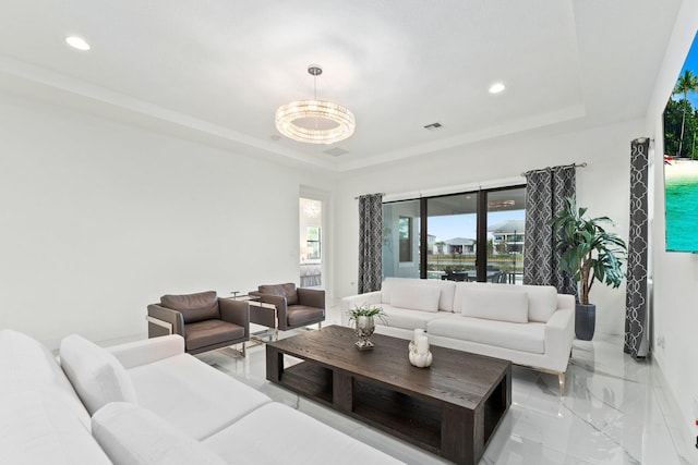 living room with a tray ceiling