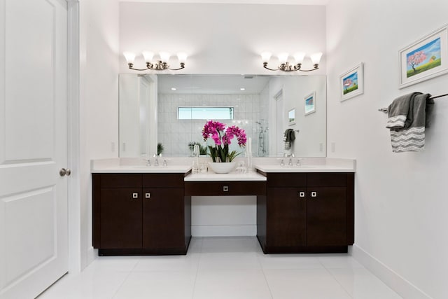 bathroom with vanity, an enclosed shower, and tile patterned flooring