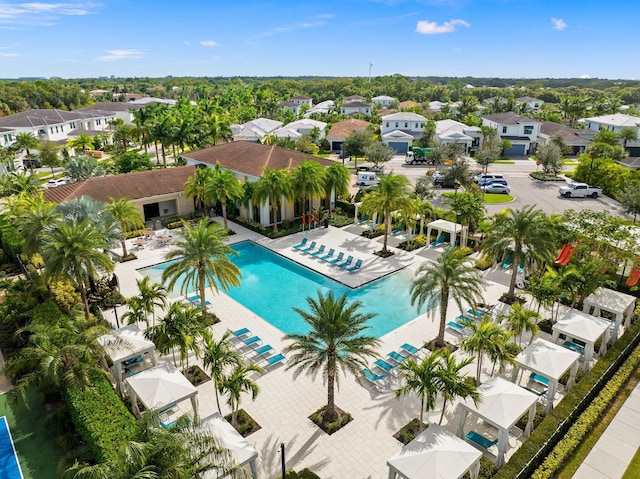 13689 Artisan Cir, Palm Beach Gardens, FL 33418 - community pool featuring a residential view
