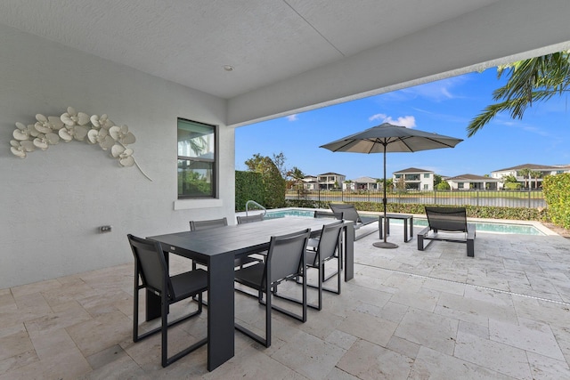 view of patio with a fenced in pool