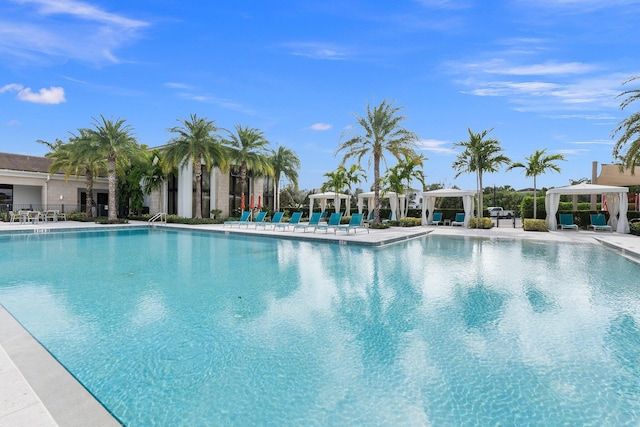 view of swimming pool with a gazebo and a patio area