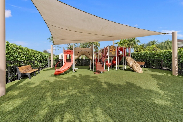 view of jungle gym featuring a yard