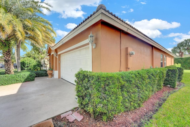 view of home's exterior featuring a garage