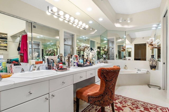 bathroom with tile patterned flooring, vanity, and plus walk in shower