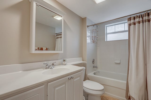 full bathroom featuring tile patterned flooring, vanity, toilet, and shower / tub combo with curtain