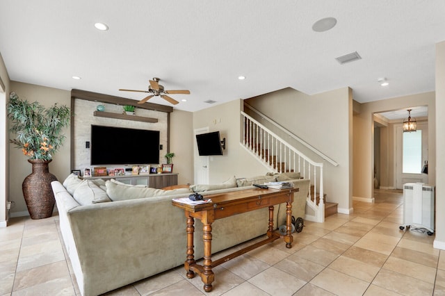 living room featuring radiator and ceiling fan