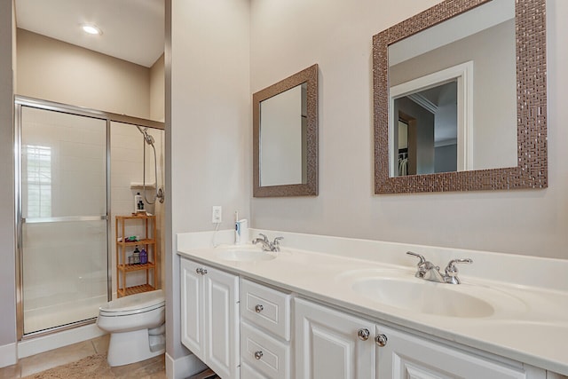 bathroom featuring walk in shower, tile patterned flooring, vanity, and toilet