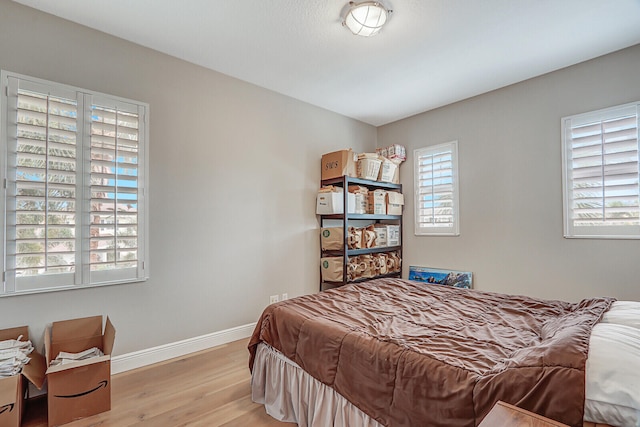 bedroom featuring light hardwood / wood-style floors