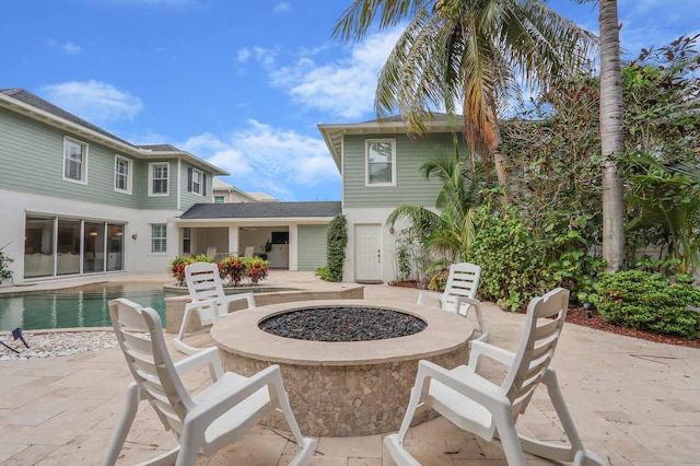 view of patio featuring a fire pit