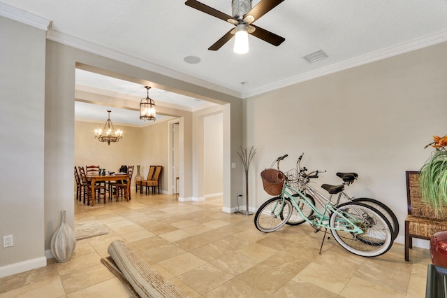 interior space with ceiling fan with notable chandelier and crown molding