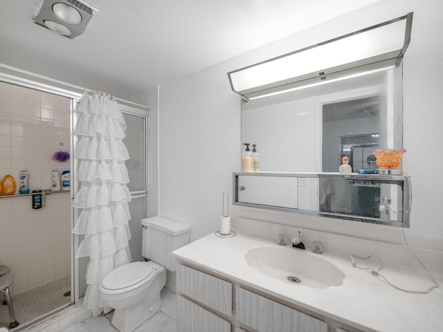 bathroom featuring walk in shower, vanity, and toilet