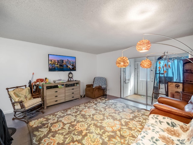 living room with a textured ceiling